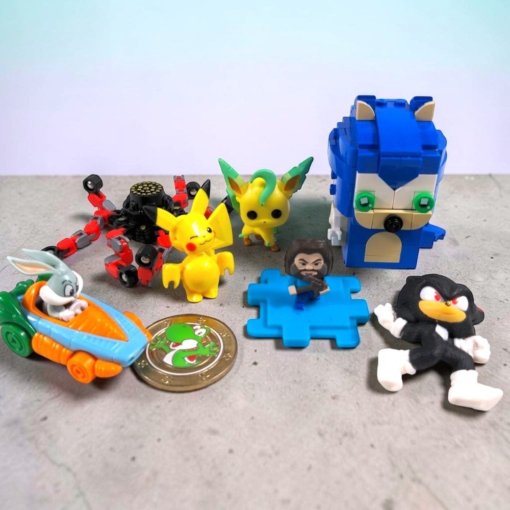 Mixed Toy Lot Sonic Pikachu Leafeon Bugs Bunny Yoshi Coin Nintendo Sega Figures